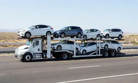 Multi-level car carrier on the highway to Tooele, Utah, United States