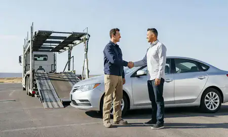 Vehicle owner beside their delivered car in Tooele, Utah, United States