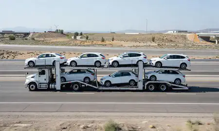 Multi-level car carrier on the highway to West Jordan, Utah, United States