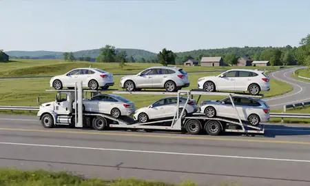 Multi-level car carrier on the highway to Castleton Four Corners, Vermont, United States