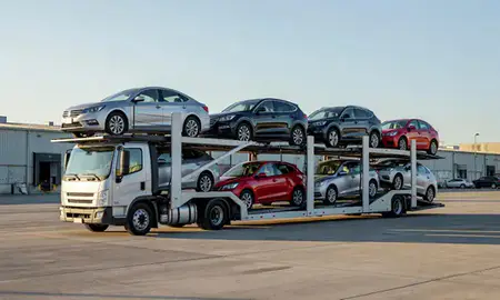Car transporter loaded with vehicles in Manchester Center, Vermont, United States