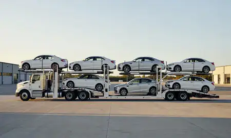 Car transporter parked in an industrial area of Saxtons River, Vermont, United States