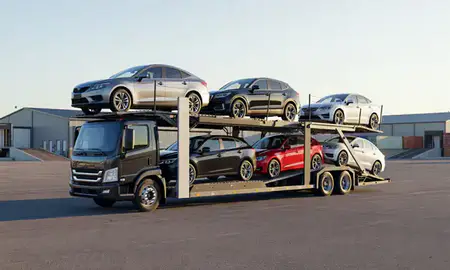 Car transporter loaded with vehicles in Underhill Flats, Vermont, United States