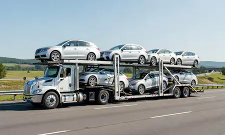 Multi-level car carrier on the highway to White River Junction, Vermont, United States