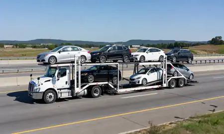 Multi-level car carrier on the highway to Arlington, Virginia, United States