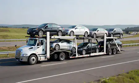 Multi-level car carrier on the highway to Blacksburg, Virginia, United States