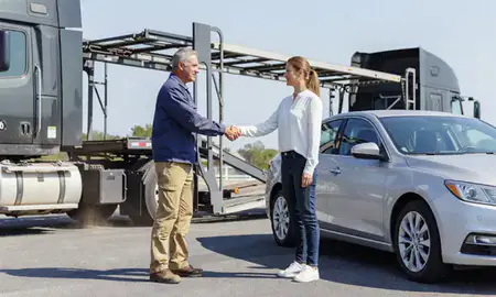 Vehicle owner beside their delivered car in Chesapeake, Virginia, United States