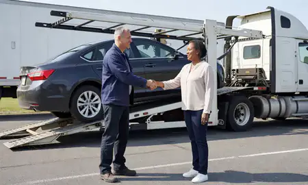 Vehicle owner beside their delivered car in Hampton, Virginia, United States