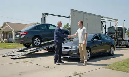 Vehicle owner beside their delivered car in Lynchburg, Virginia, United States