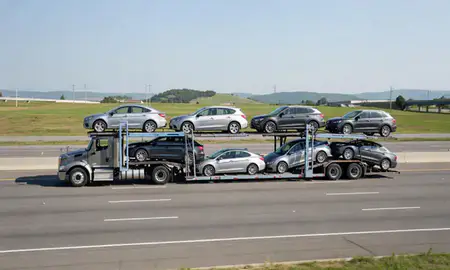 Multi-level car carrier on the highway to Manassas, Virginia, United States