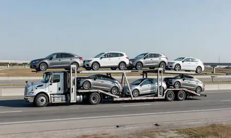 Multi-level car carrier on the highway to Newport News, Virginia, United States