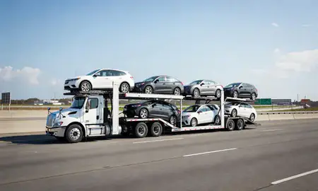 Multi-level car carrier on the highway to Norfolk, Virginia, United States