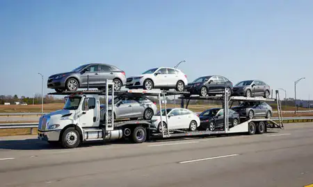 Multi-level car carrier on the highway to Portsmouth, Virginia, United States