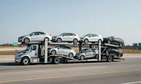 Multi-level car carrier on the highway to Reston, Virginia, United States