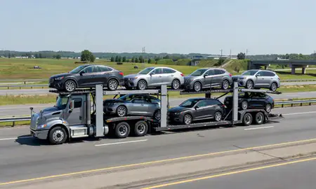Multi-level car carrier on the highway to Richmond, Virginia, United States