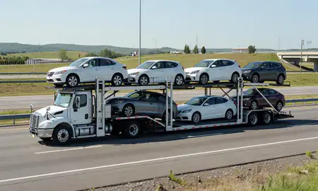 Multi-level car carrier on the highway to Roanoke, Virginia, United States