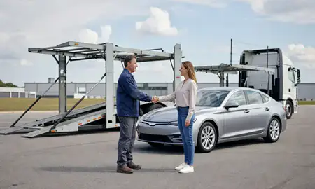 Vehicle owner beside their delivered car in Suffolk, Virginia, United States