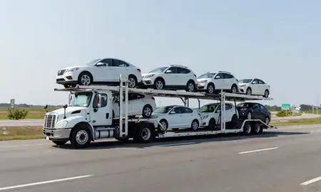 Multi-level car carrier on the highway to Williamsburg, Virginia, United States
