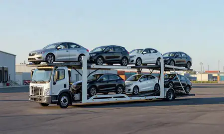 Car transporter loaded with vehicles in Williamsburg, Virginia, United States