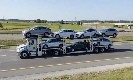 Multi-level car carrier on the highway to Winchester, Virginia, United States
