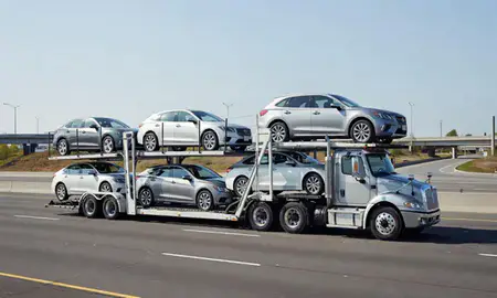 Multi-level car carrier on the highway to Bellevue, Washington, United States