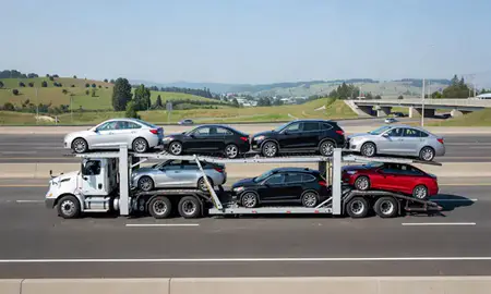 Multi-level car carrier on the highway to Kent, Washington, United States