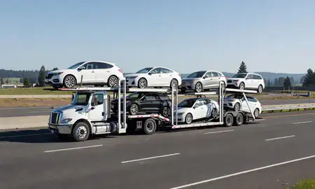 Multi-level car carrier on the highway to Lacey, Washington, United States
