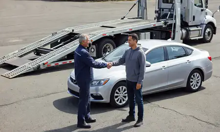 Vehicle owner beside their delivered car in Lakewood, Washington, United States