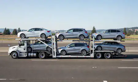 Multi-level car carrier on the highway to Longview, Washington, United States