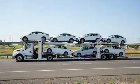 Multi-level car carrier on the highway to Marysville, Washington, United States