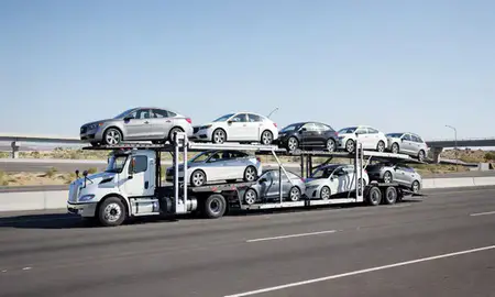 Multi-level car carrier on the highway to Richland, Washington, United States