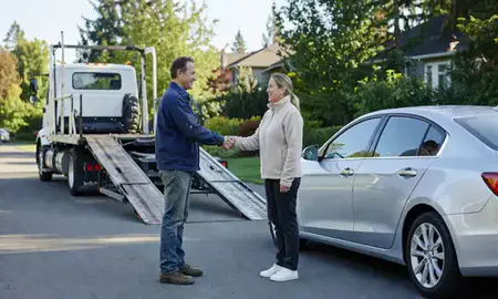 Vehicle owner beside their delivered car in Sammamish, Washington, United States