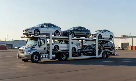 Car transporter loaded with vehicles in South Hill, Washington, United States