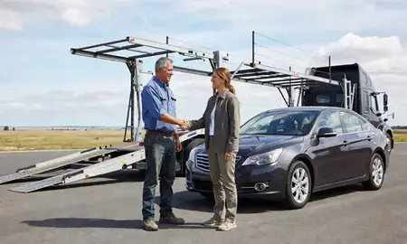 Vehicle owner beside their delivered car in Spokane Valley, Washington, United States