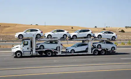Multi-level car carrier on the highway to Wenatchee, Washington, United States