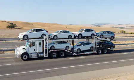 Multi-level car carrier on the highway to Yakima, Washington, United States