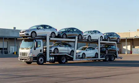 Car transporter loaded with vehicles in Yakima, Washington, United States