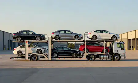 Car transporter parked in an industrial area of Beckley, West Virginia, United States
