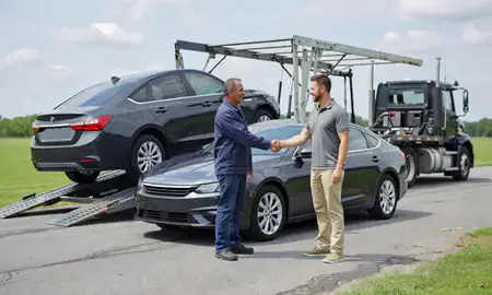 Vehicle owner beside their delivered car in Brookhaven, West Virginia, United States
