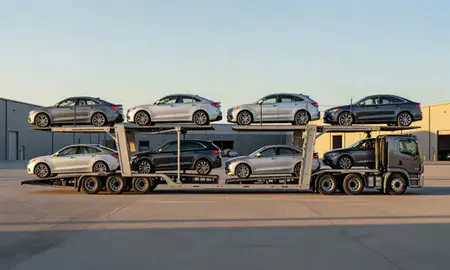 Car transporter parked in an industrial area of Brookhaven, West Virginia, United States