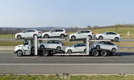 Multi-level car carrier on the highway to Charles Town, West Virginia, United States
