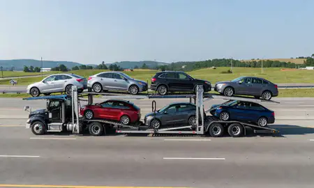 Multi-level car carrier on the highway to Charleston, West Virginia, United States
