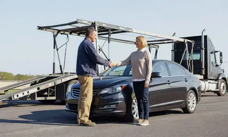 Vehicle owner beside their delivered car in Clarksburg, West Virginia, United States