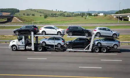 Multi-level car carrier on the highway to Cross Lanes, West Virginia, United States
