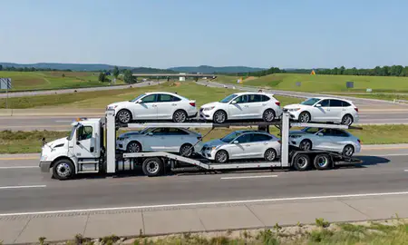 Multi-level car carrier on the highway to Martinsburg, West Virginia, United States