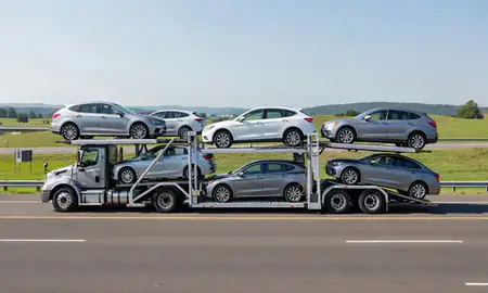 Multi-level car carrier on the highway to Moundsville, West Virginia, United States