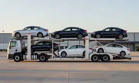 Car transporter parked in an industrial area of New Martinsville, West Virginia, United States