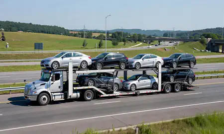 Multi-level car carrier on the highway to Princeton, West Virginia, United States
