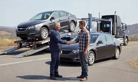Vehicle owner beside their delivered car in Teays Valley, West Virginia, United States
