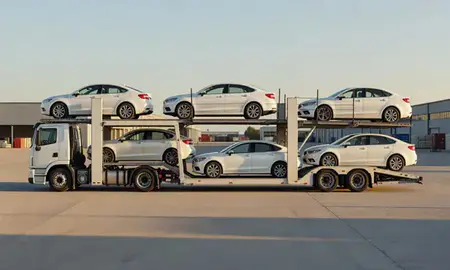 Car transporter parked in an industrial area of Vienna, West Virginia, United States